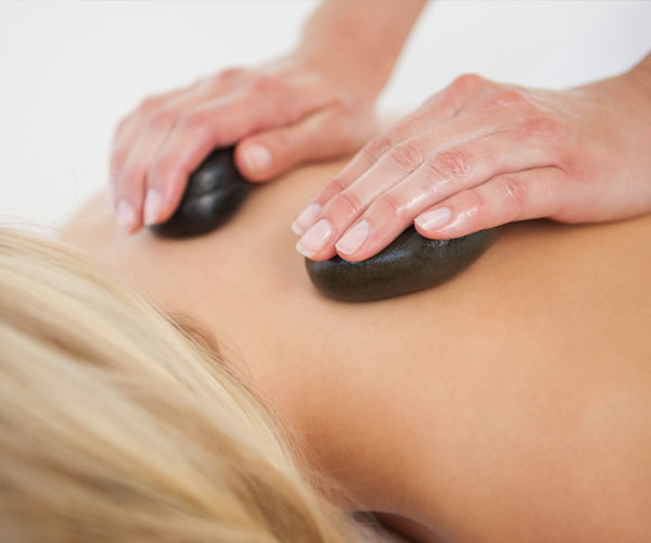 Hot Stone Massage | Norton Sports Massage Therapy